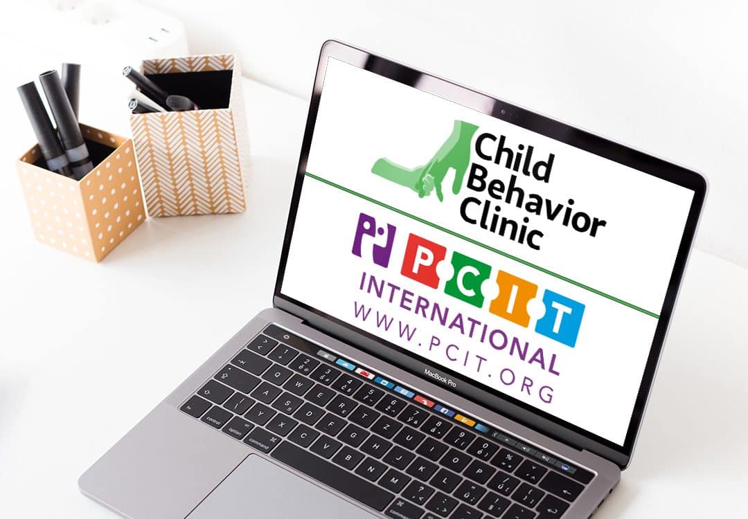 Photo of Child Behavior Clinic and PCIT Therapy Logos on Laptop